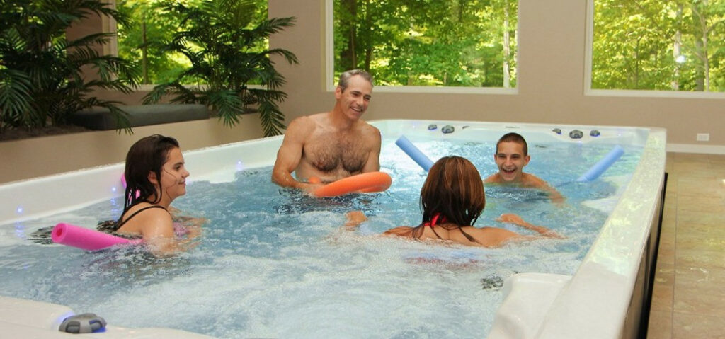 PDC Spas swim spas - family in indoor swim spa