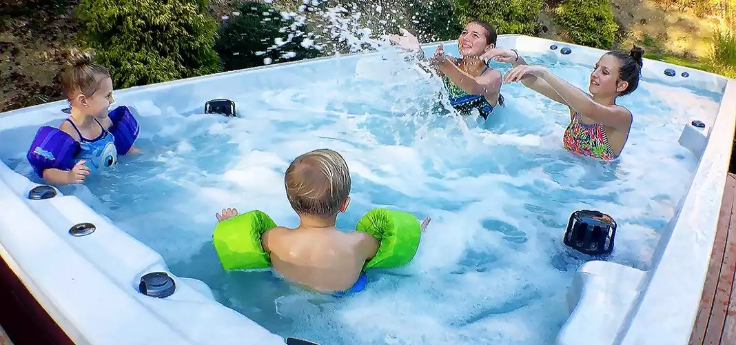 Family enjoy in PDC swim spa